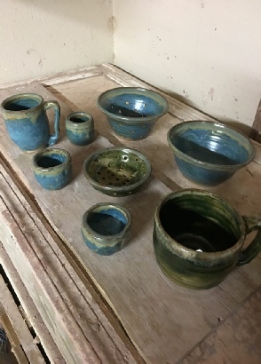  mugs and bowls I made for my son  made by  local artist & Realtor Ron Zemetres