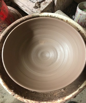 nice big bow madel on wheel by Lutz Pottery