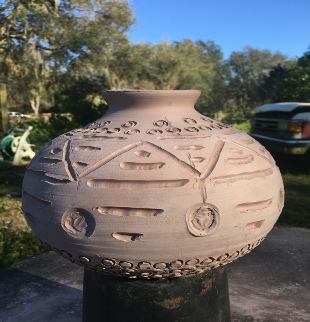 hand carved bottle drying, lutz pottery