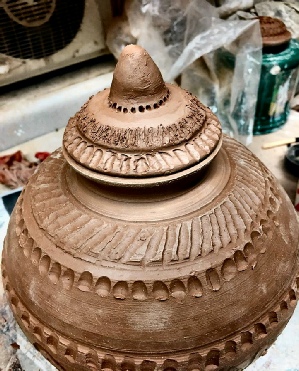 stone ware hand carved cookie jar,made by  local artist & Realtor Ron zemetres