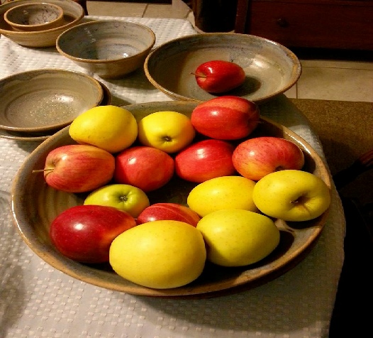 high fired stone ware bowl with apples made by  local artist & Realtor Ron zemetres