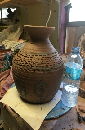 large hand carved vase
